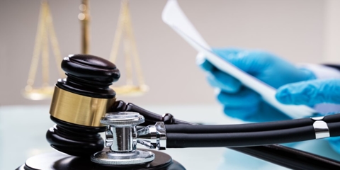 judges gavel with physicians stethoscope