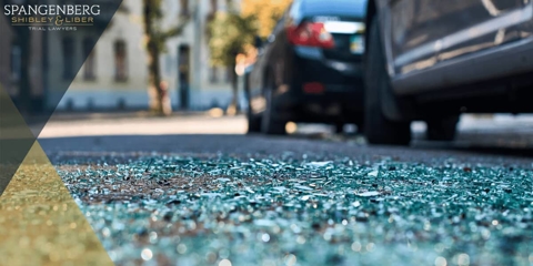 glass on the ground after a car crash
