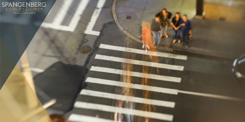 pedestrians crossing the street