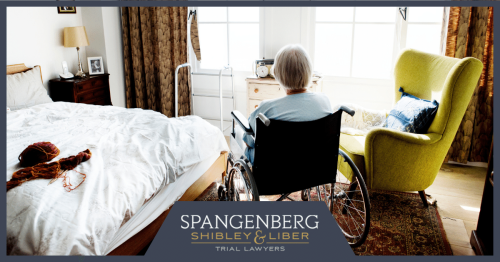 elderly woman sitting in a nursing home