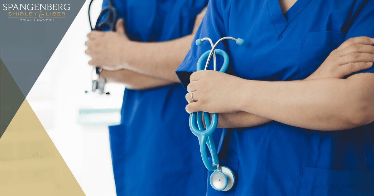 doctors holding stethoscopes