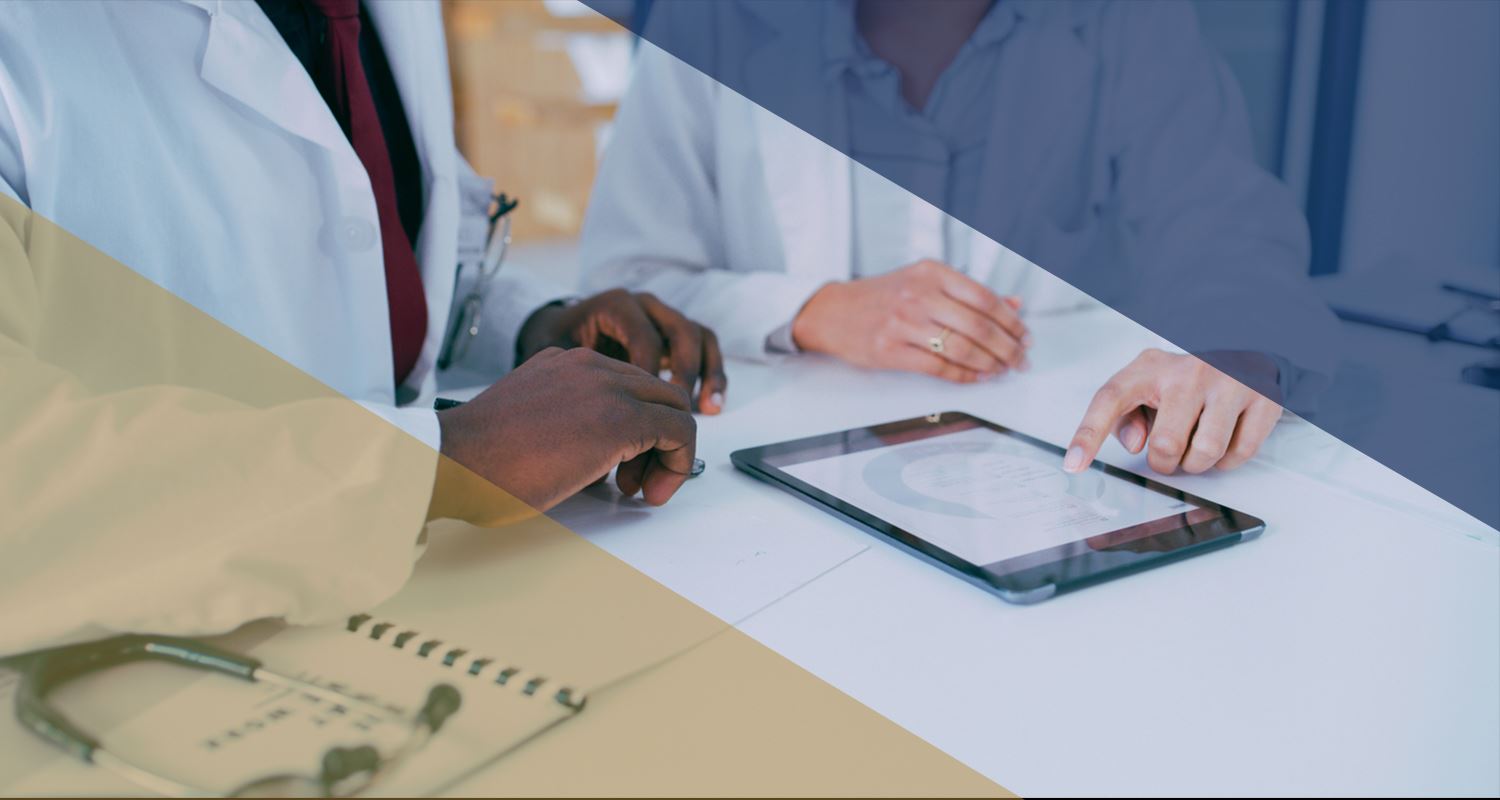 doctors discussing notes on a case