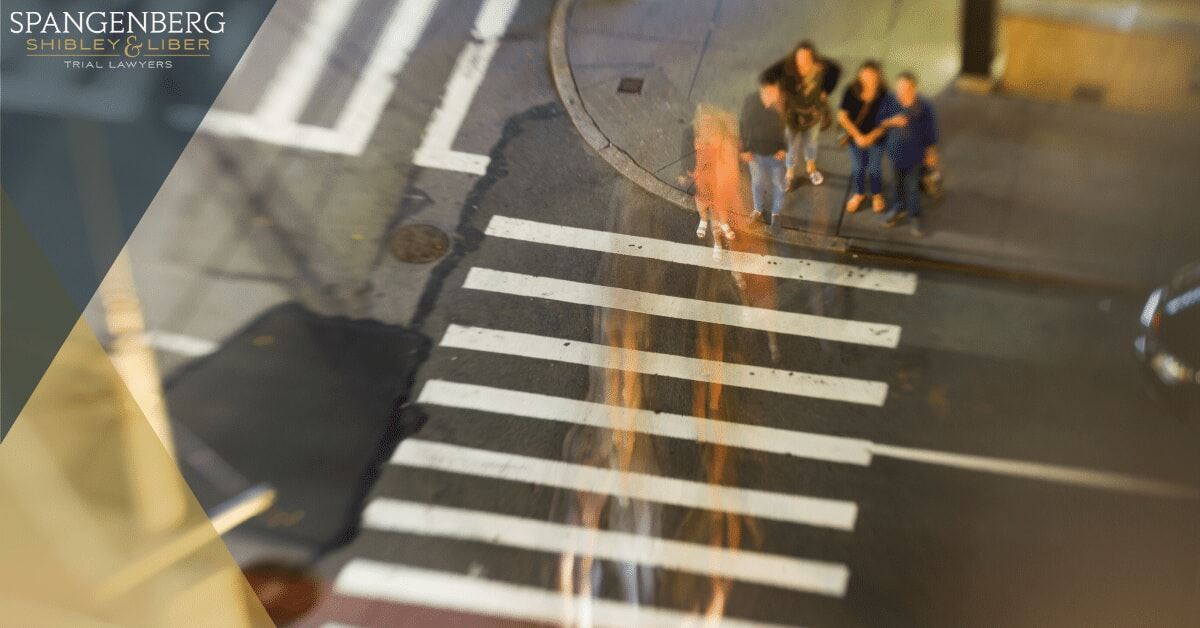 pedestrians crossing the street