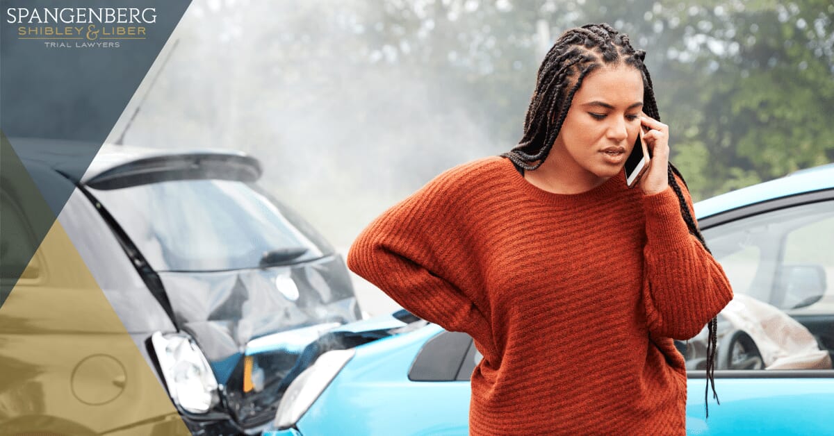 woman reporting her car accident