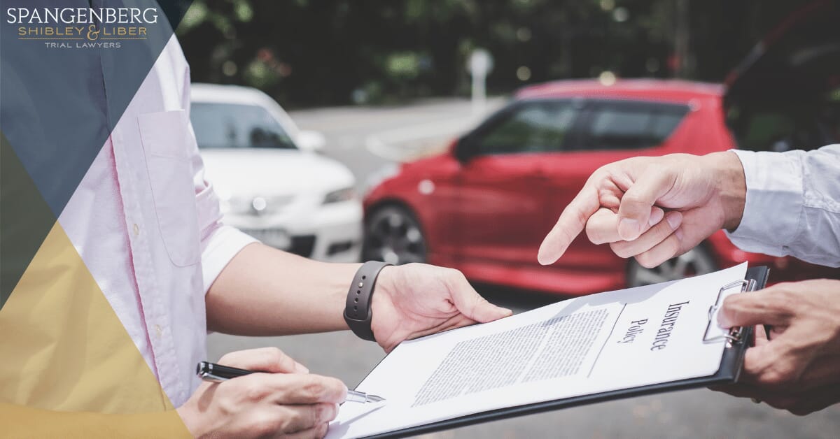 accident victim speaking with insurance adjuster